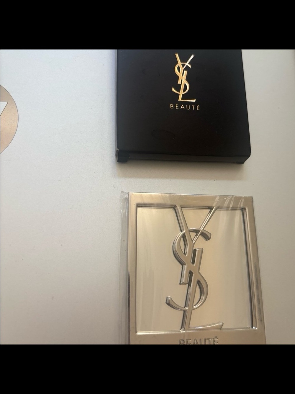 Yves Saint Laurent Silver purse mirror